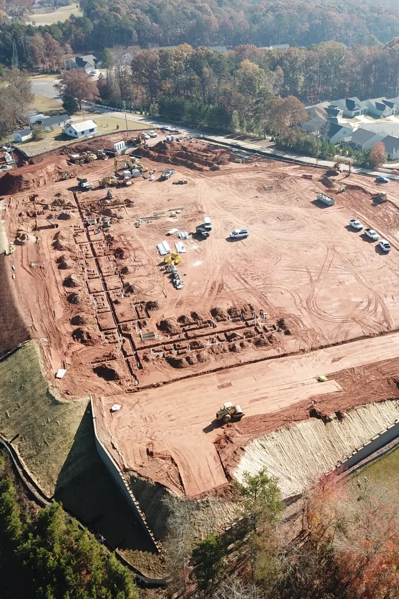 Active construction site with foundation work underway